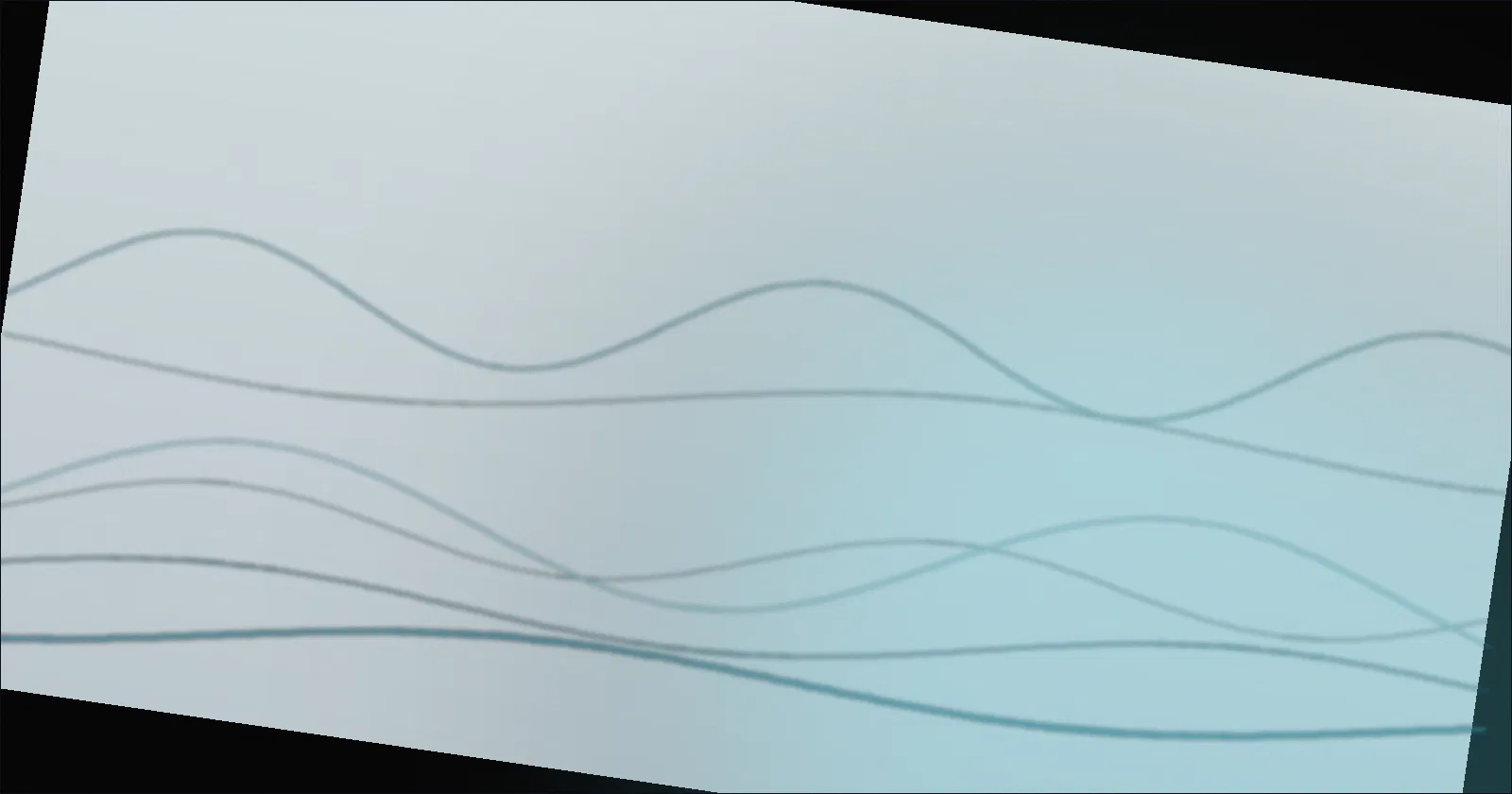 Sheet music and a pair of headphones next to a game controller